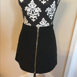 H&M’s brand faux suede mini skirt